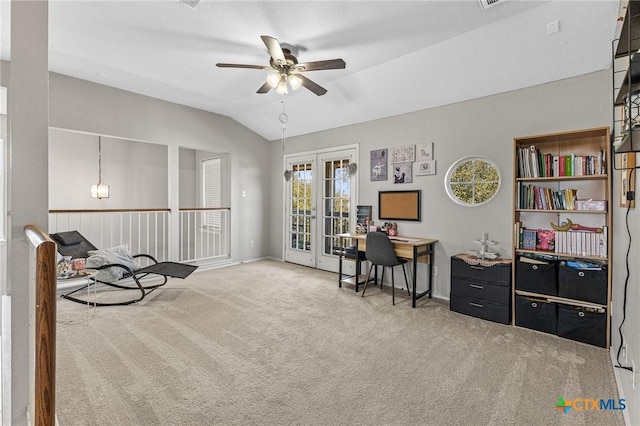 carpeted office featuring lofted ceiling, ceiling fan, and french doors