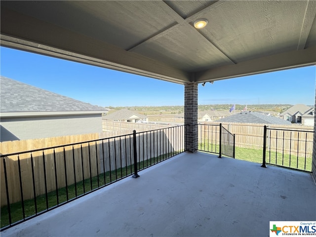 view of patio / terrace with a balcony