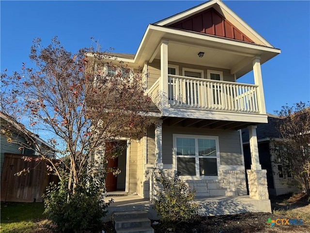 craftsman house with a balcony