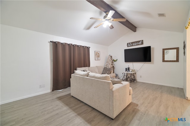 living room featuring ceiling fan, light wood-type flooring, and lofted ceiling with beams