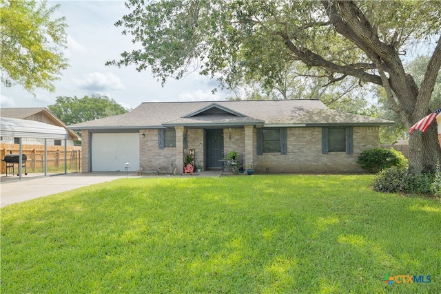 single story home with a garage and a front yard