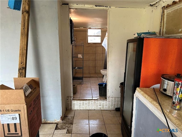 bathroom with tile patterned flooring