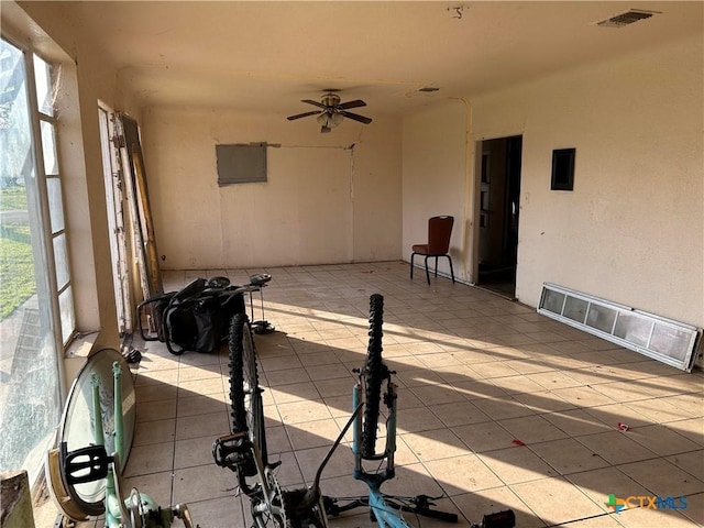 view of patio / terrace featuring ceiling fan