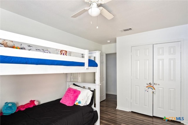 5607 Schorn Dr, Killeen, TX 76542 - bedroom with dark wood finished floors, a closet, baseboards, and a ceiling fan