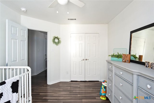 5607 Schorn Dr, Killeen, TX 76542 - bedroom with dark wood finished floors, a closet, baseboards, and ceiling fan