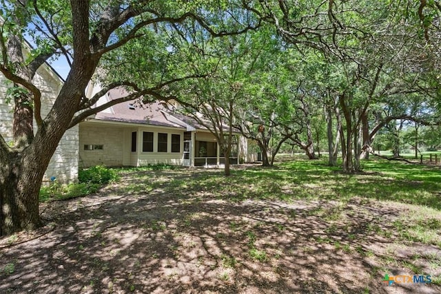 11740 Stinnett Mill Rd, Salado, TX 76571 - view of yard featuring a sunroom