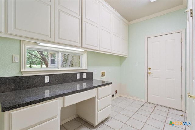 11740 Stinnett Mill Rd, Salado, TX 76571 - washroom with hookup for a washing machine, cabinet space, light tile patterned flooring, and an office area
