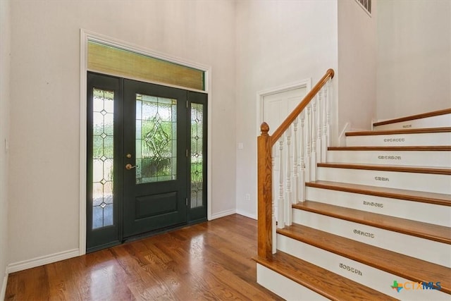 11740 Stinnett Mill Rd, Salado, TX 76571 - foyer entrance with stairway, wood finished floors, and a towering ceiling