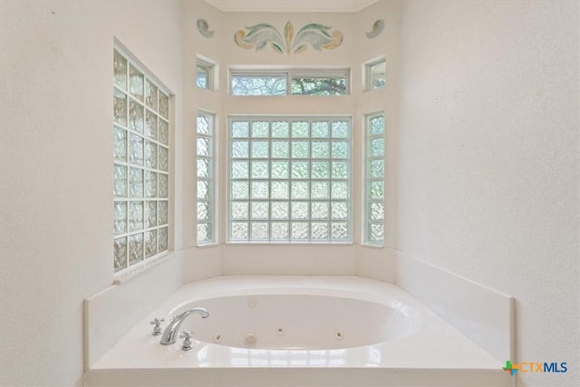 11740 Stinnett Mill Rd, Salado, TX 76571 - full bath with plenty of natural light and a whirlpool tub