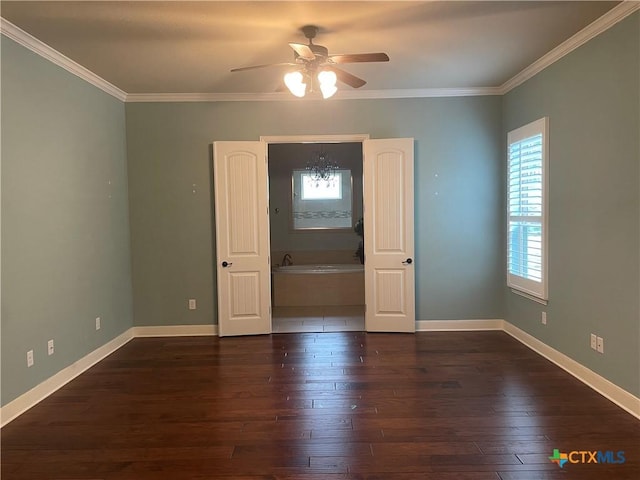 750 Mission Hts, New Braunfels, TX 78130 - empty room featuring dark wood-style flooring, a ceiling fan, crown molding, and baseboards