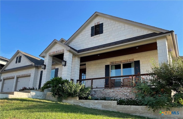 750 Mission Hts, New Braunfels, TX 78130 - view of front of house with a porch, stone siding, and a garage