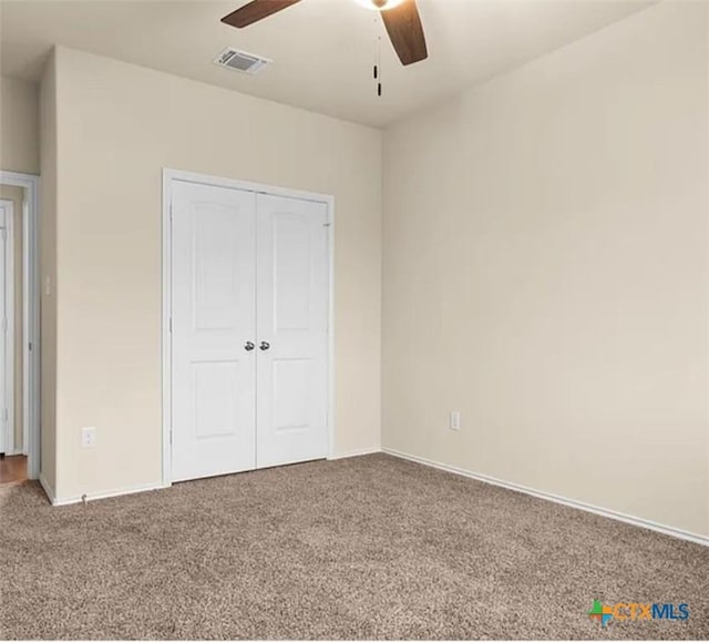5561 Perdita Dr, Belton, TX 76513 - unfurnished bedroom with baseboards, visible vents, a closet, and carpet