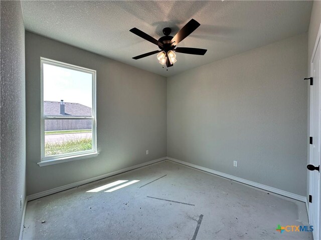 2598 Settlers Oak Dr, Belton, TX 76513 - empty room with healthy amount of natural light, baseboards, and ceiling fan