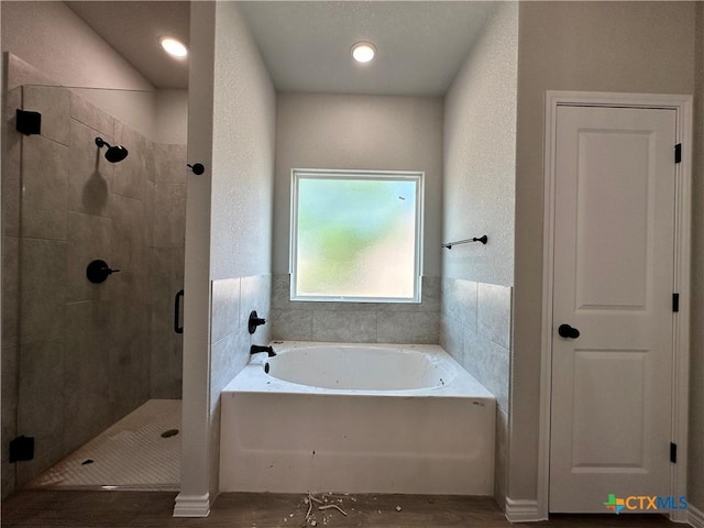 2598 Settlers Oak Dr, Belton, TX 76513 - full bath featuring a bath, a shower stall, and wood finished floors