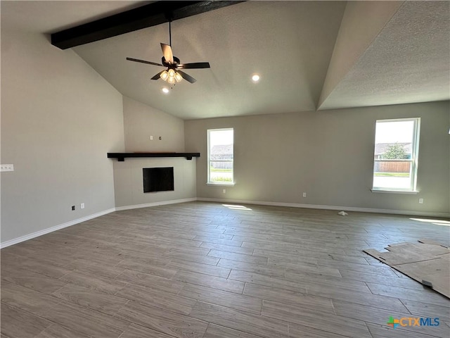 2598 Settlers Oak Dr, Belton, TX 76513 - unfurnished living room with plenty of natural light, ceiling fan, wood finished floors, recessed lighting, and a textured ceiling