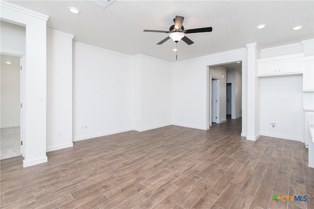 unfurnished living room with crown molding, ceiling fan, and wood-type flooring