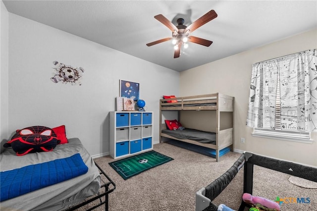 2311 Sparrow Rd, Killeen, TX 76542 - bedroom with carpet flooring, a ceiling fan, and baseboards