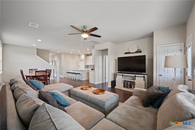11820 Offaly Dr, Austin, TX 78754 - living room featuring a ceiling fan, dark wood-type flooring, and recessed lighting