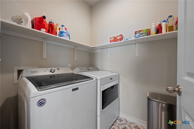 11820 Offaly Dr, Austin, TX 78754 - laundry area with independent washer and dryer and light flooring