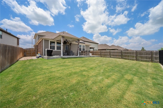11820 Offaly Dr, Austin, TX 78754 - rear view of property featuring a fenced backyard, ceiling fan, and a patio