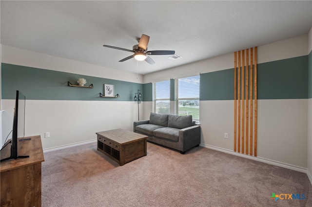11820 Offaly Dr, Austin, TX 78754 - carpeted living area featuring ceiling fan and baseboards