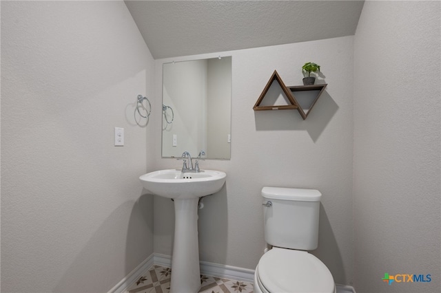 11820 Offaly Dr, Austin, TX 78754 - bathroom with tile patterned floors and a textured ceiling