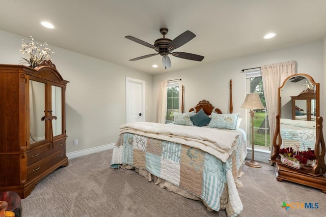 bedroom with carpet floors, recessed lighting, and multiple windows