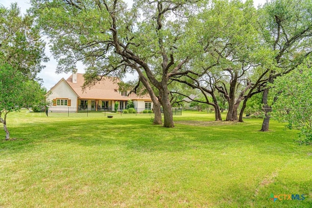 view of yard featuring fence