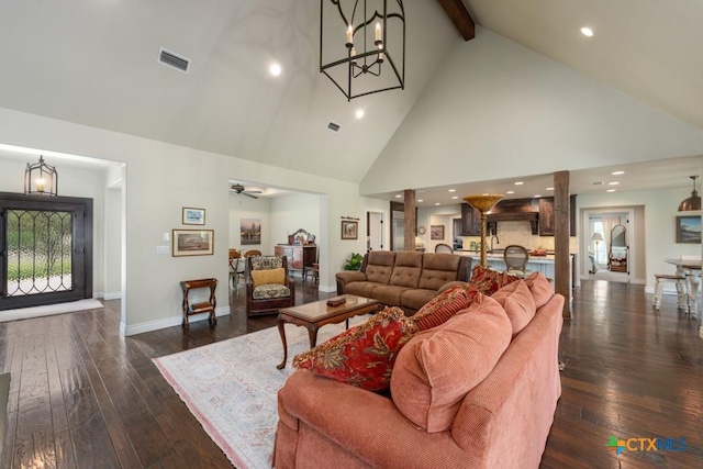 living area featuring beamed ceiling, high vaulted ceiling, wood-type flooring, and visible vents