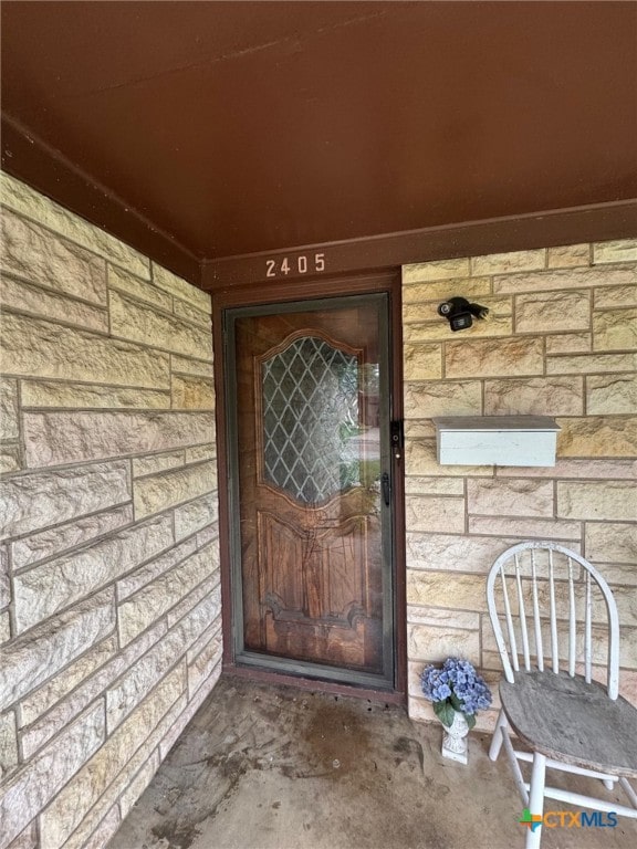 2405 Oak Dr, Gatesville, TX 76528 - property entrance featuring stone siding