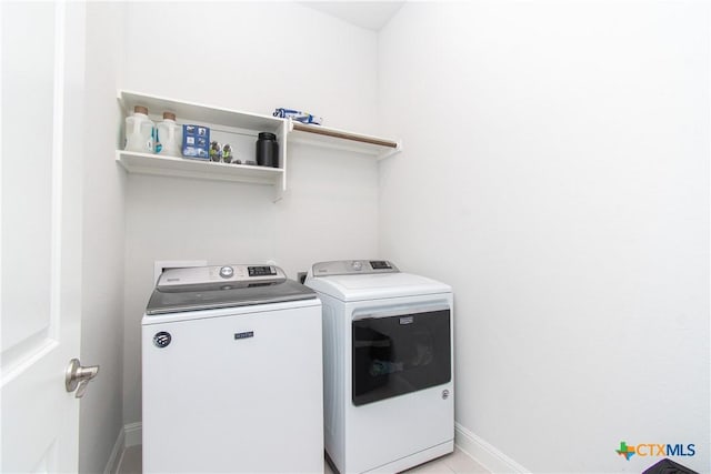 washroom featuring separate washer and dryer