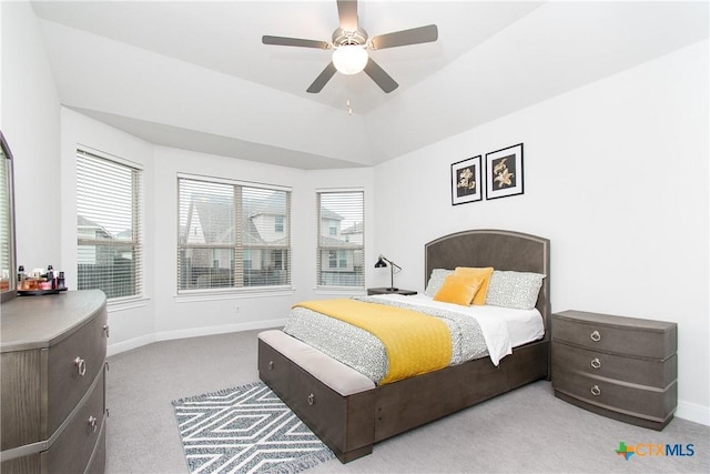 bedroom with light colored carpet and ceiling fan