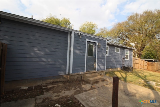 view of property exterior featuring a patio