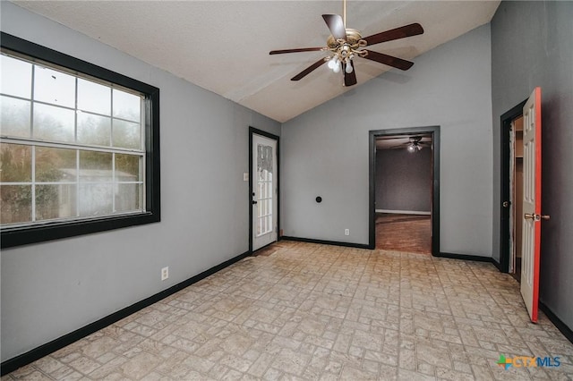 unfurnished bedroom featuring vaulted ceiling and ceiling fan