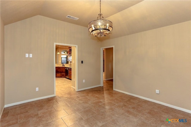 unfurnished room with a notable chandelier, vaulted ceiling, and sink