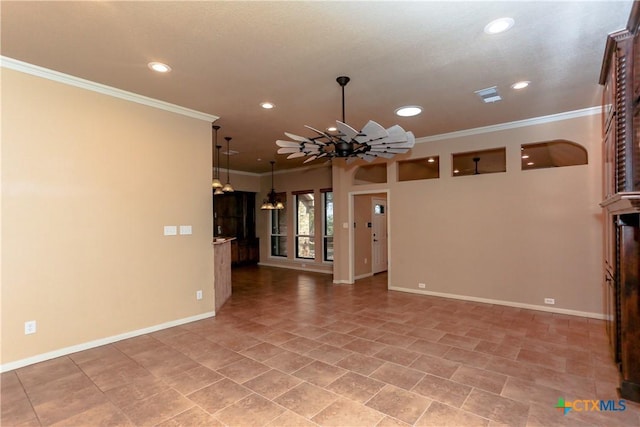 unfurnished living room featuring crown molding and a notable chandelier