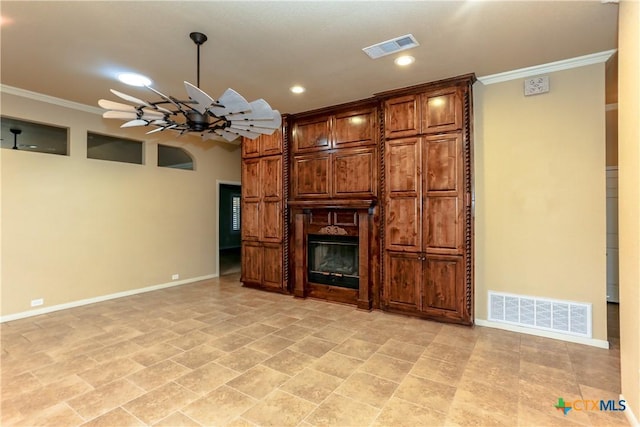 unfurnished living room with ornamental molding