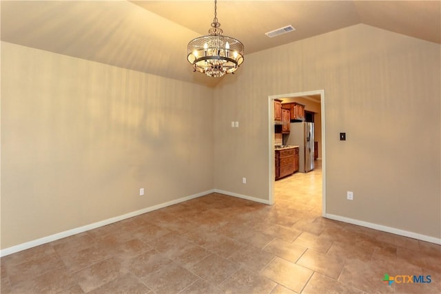 unfurnished room with a notable chandelier and vaulted ceiling