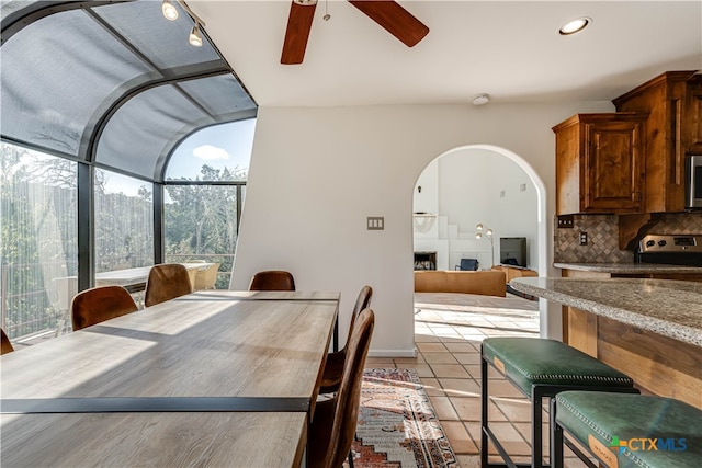 dining space featuring ceiling fan