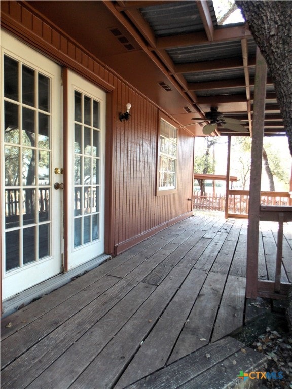 wooden terrace with ceiling fan