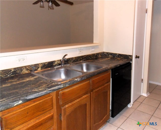 kitchen with ceiling fan, sink, black dishwasher, and light tile patterned floors