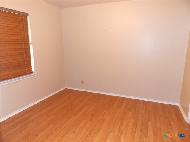 empty room featuring light hardwood / wood-style flooring