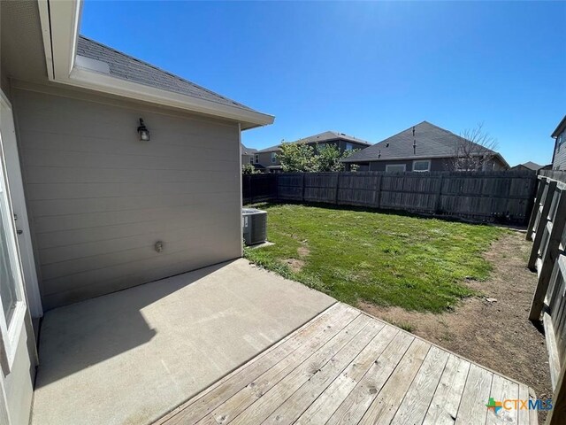 2092 Brandywine Dr, New Braunfels, TX 78130 - view of yard with central AC, a wooden deck, and a patio