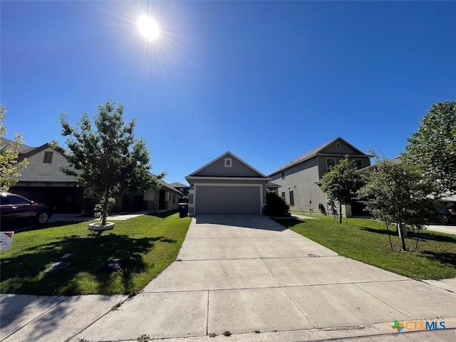 2092 Brandywine Dr, New Braunfels, TX 78130 - view of front of home featuring a front lawn, concrete driveway, and an attached garage