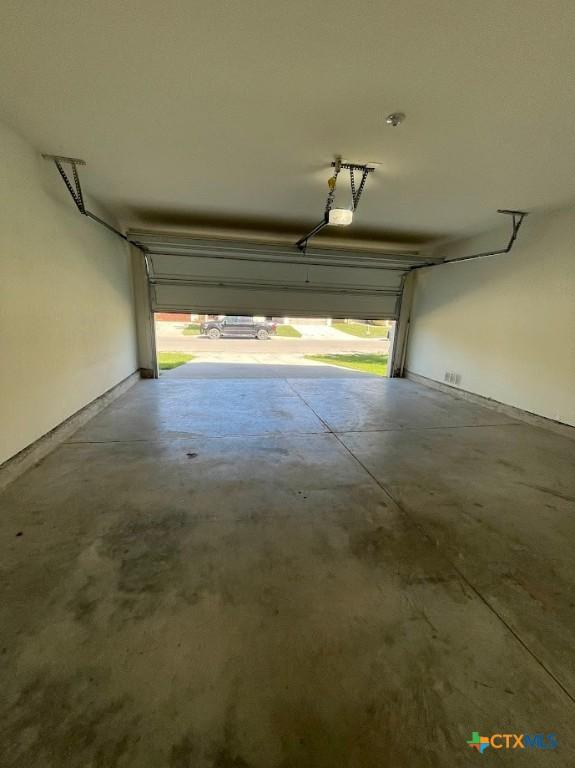 2092 Brandywine Dr, New Braunfels, TX 78130 - garage with a garage door opener