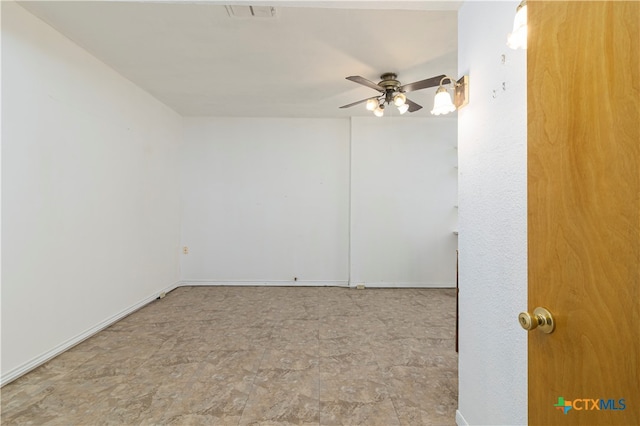 empty room featuring ceiling fan