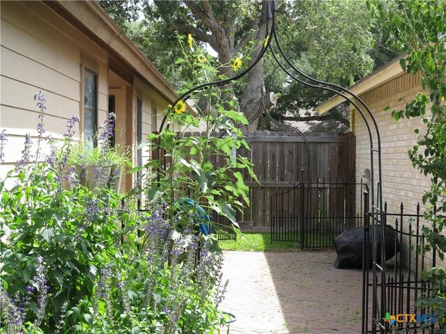 310 Rattan Dr, Victoria, TX 77901 - view of patio / terrace with a wooden deck