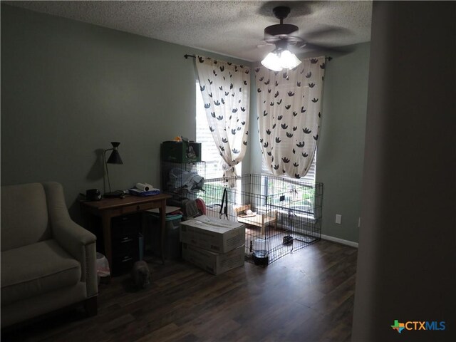 310 Rattan Dr, Victoria, TX 77901 - office with ceiling fan, wood finished floors, and a textured ceiling