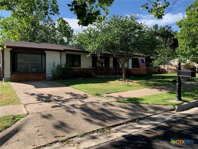 1101 S 17th St, Copperas Cove, TX 76522 - view of front of house featuring brick siding and a front lawn