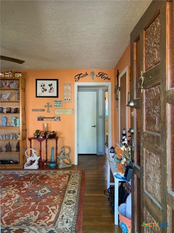 1101 S 17th St, Copperas Cove, TX 76522 - foyer with wood finished floors and a textured ceiling